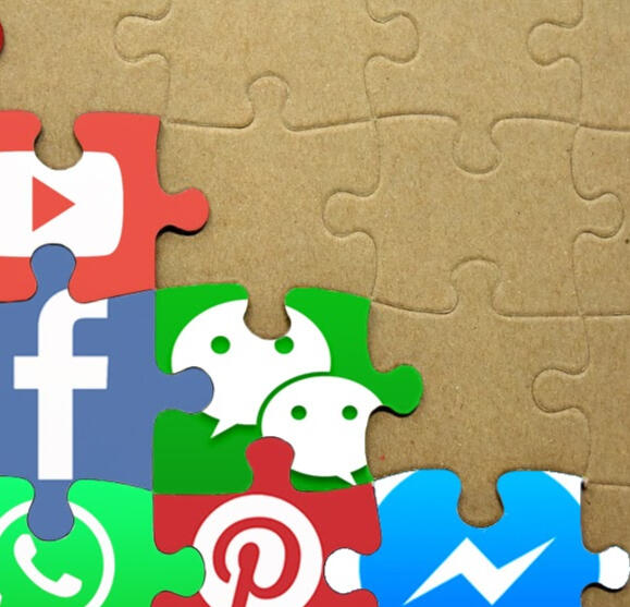 puzzle pieces with social media logos